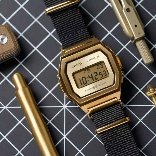 Casio Vintage Illuminator Stainless Steel Golden Nylon Belt Watch A1000MGN-9ER