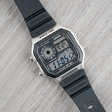 Casio Youth World Time Digital Resin Belt Watch AE-1200WH-1CVCF